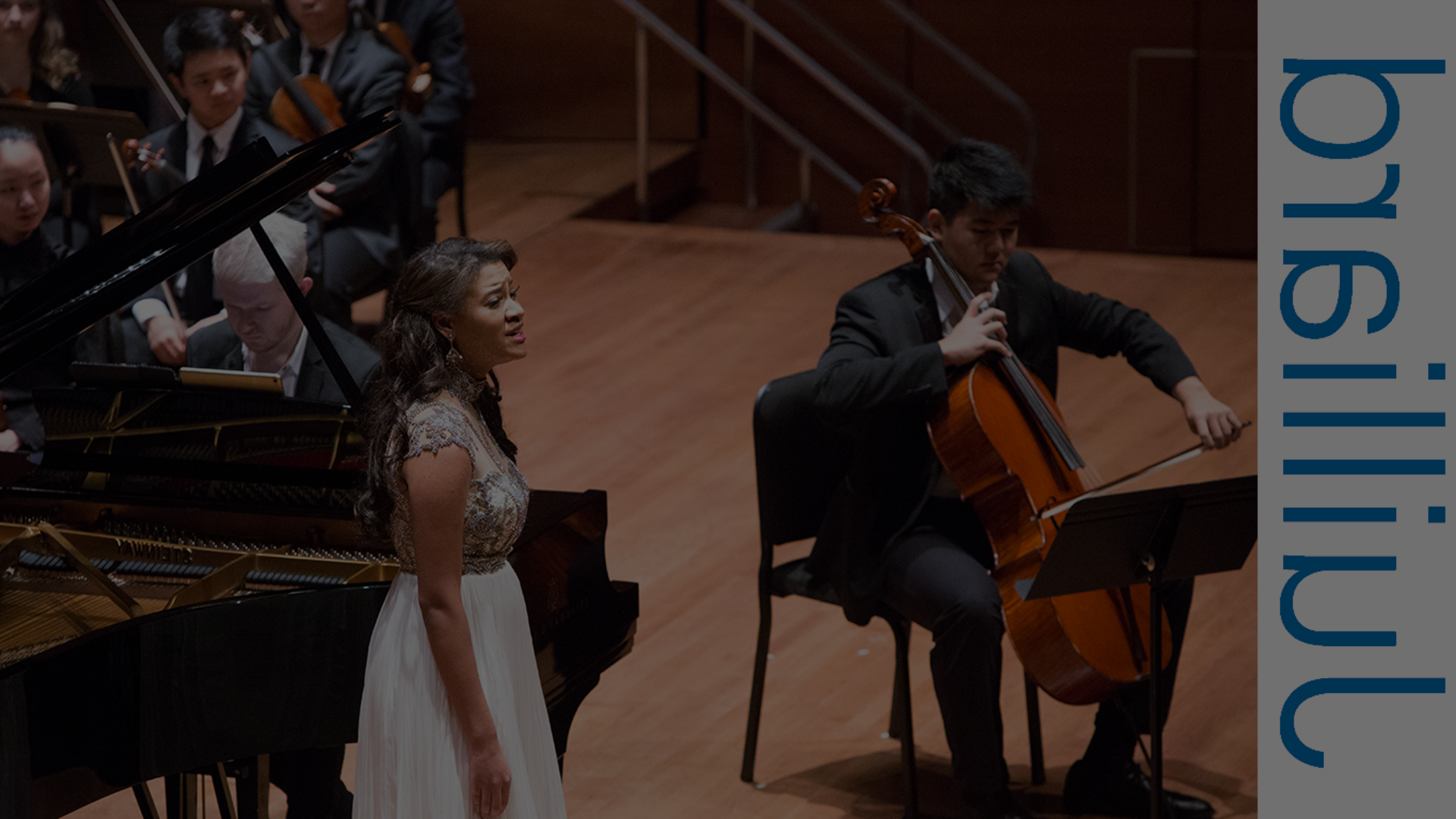 Singer on stage with man playing the cello